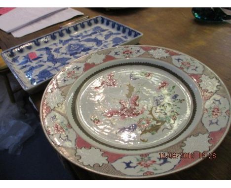 Two plates to include an 18th century Chinese famille rose charger and a Chinese blue tray 