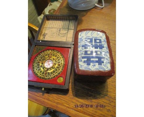 A Chinese compass box and a Chinese lacquered box 
