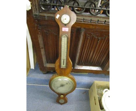 A 19th century oak cased banjo barometer 