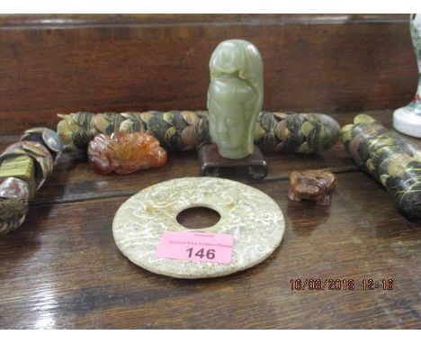 A mixed lot to include a jade bi disc, a small jade money toad, a small jade Buddha head with base and other items 