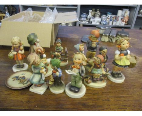 A collection of Goebel Hummel figurines 