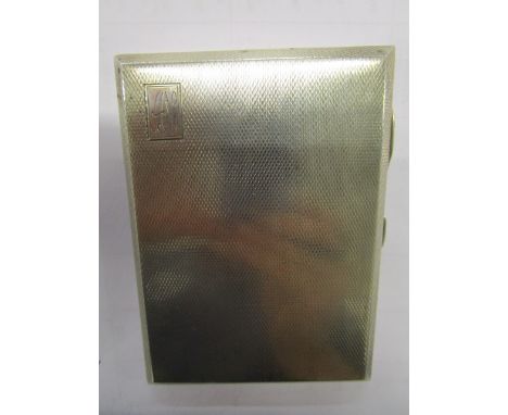 A Sterling silver cigarette case with machine tooled decoration, gilt interior, engraved initials to cartouche to front, make