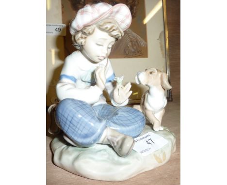 Lladro figure of a young boy with dog