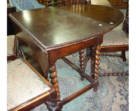 Oak drop leaf table on barley twist supports