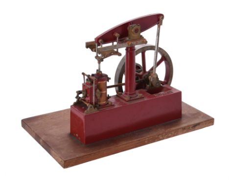   A model of a Stuart Turner beam engine, the beam supported on central turned column with Watt's parallel motion, split bear