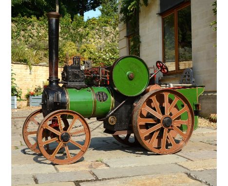   A freelance approximate 4 inch scale model of an agricultural traction engine, having single cylinder with steam chest to s