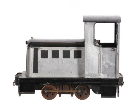 A 5 inch gauge model of a 0-4-0  diesel shunter, being battery powered with control switches to cab. Being of traditional des
