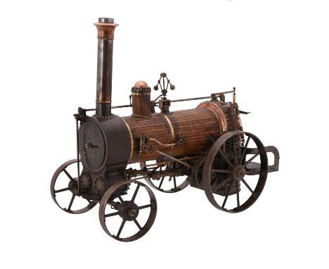 A fine 19th century museum standard model of an early British live steam agricultural traction engine, the copper boiler havi