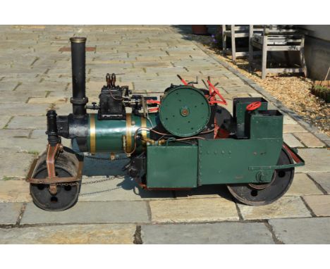   A freelance approximate 3 inch scale model of a live steam road roller, having single cylinder with steam safety valve to t