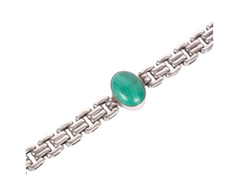 A heavy sterling silver gatelink bracelet, set with an oval cabochon malachite stone 