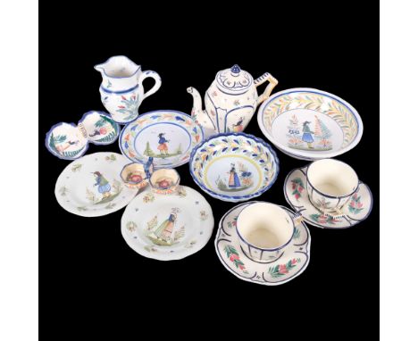 A collection of quimper, including a teapot (spout chipped), jug and various plates 