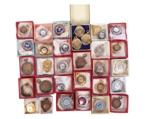 A large group of table tennis medals, including silver and enamel 