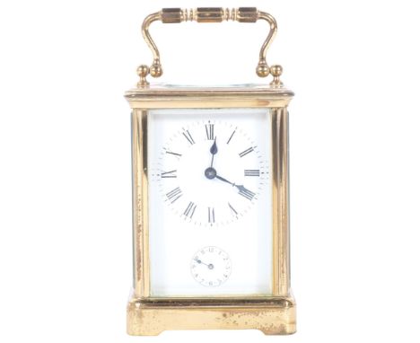 A French brass-cased carriage clock with alarm, height 11cm not including handle (currently not in working condition) 