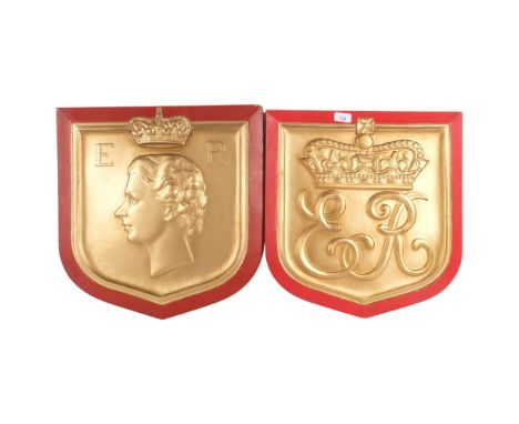 A pair of 1953 Coronation painted embossed wood window decorations, depicting a portrait of the Queen and the ER motif, H48cm