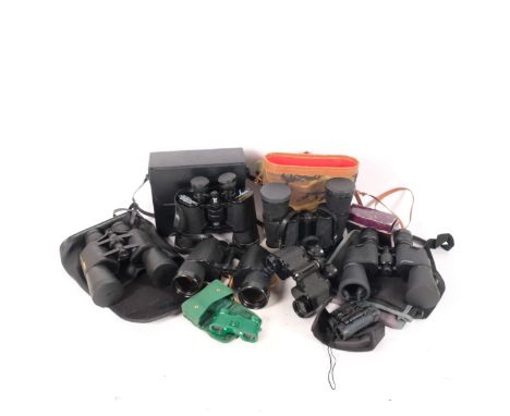 A quantity of Vintage binoculars, including Karl Zeiss Jenna, Jenoptem 10x50W field binoculars, Tohyoh Tokyo 7x50 binoculars,