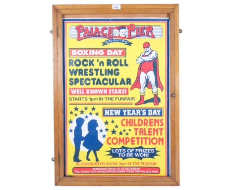 A Vintage oak-framed Palace Pier Brighton poster for Boxing Day and New Year's Day, height 84cm overall 