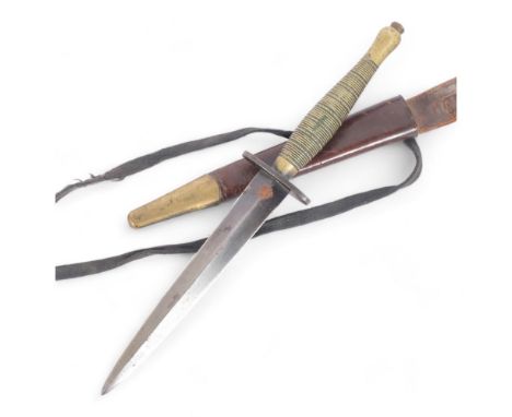 A Fairbairn Sykes World War II Period Commando dagger, military cypher to the brass handle, blade length 16cm, 29cm overall, 
