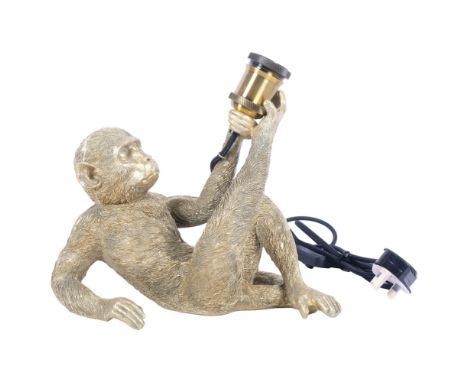 A composition table lamp, modelled as a gilded monkey, H26cm 