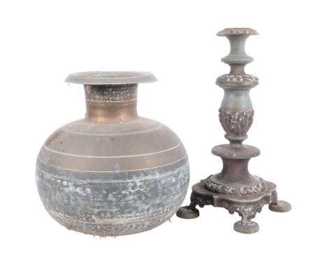 Antique copper pot with turned decoration, H30cm, and a cast and embossed verdigris metal candlestick on 4 feet 