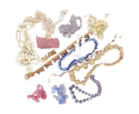 A box of various costume jewellery, including carnelian beads, pearl necklaces, glass bead necklace, etc 