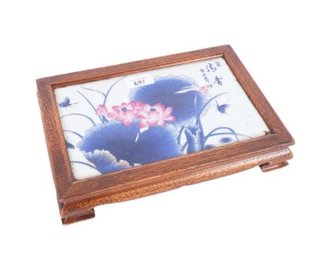 A Chinese ceramic-topped carved wood stand, with water lily decoration, L29cm 