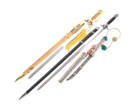 A reproduction dagger in embossed silvered metal scabbard, 50cm, and 2 reproduction swords in scabbards 