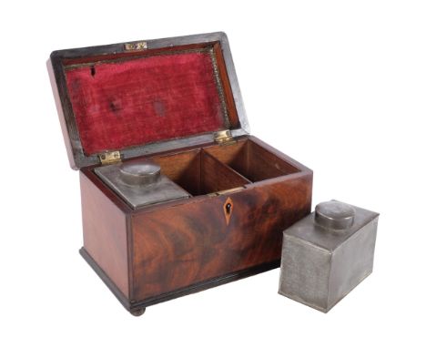 A Georgian tea caddy, with cross-banded decoration, and 2 pewter inserts, 24cm x 18cm x 15cmNo key present 