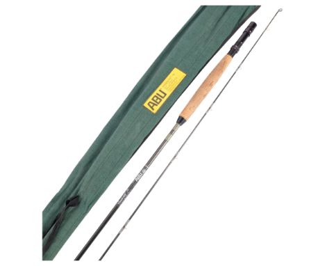 A Vintage Swedish ABU Carbolite 78 9' or 275cm 2-piece carbon fibre fishing rod, with associated softshell case, and protecti