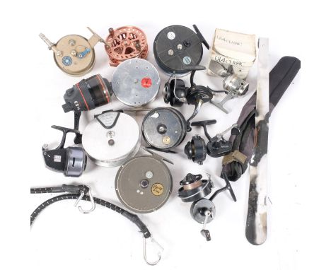 A quantity of various Vintage fishing reels, spools, and other accessories, various brands including ABU, Adcock, Mercury, et