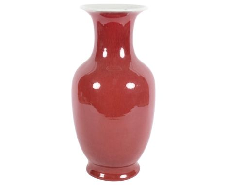 An Oriental ceramic sang de boeuf baluster vase, H41cm 