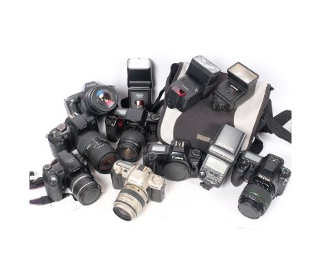 A quantity of Vintage cameras and equipment, including a Pentax K-7, a Pentax MZ-50, a Canon EOS600 and associated Sigma lens