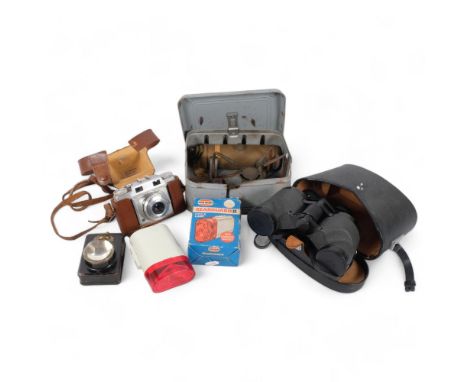 A cased pair of binoculars, a Vintage petrol gas stove, etc 