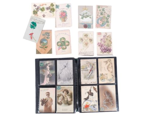 A collection of Vintage French April Fool's Day postcards, and a small collection of clover decorated postcards 