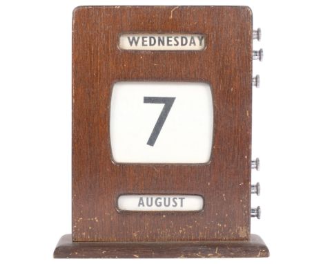 A Vintage stained wood table-top perpetual calendar, with chrome fittings, H23cm 