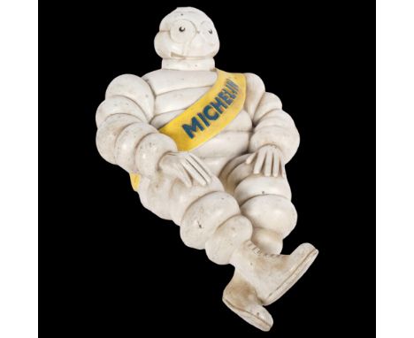 A mid-century painted composition Michelin Man shelf figure (A/F), H35cm.This is a 1950s piece, originally made to be mounted
