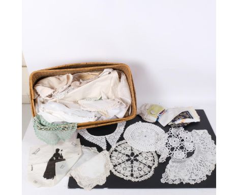 A large quantity of Vintage table linen, doilies, place mats and tablecloths, etc 