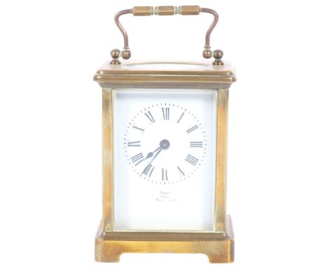 VOKERS, BATH - a brass-cased carriage clock, height 11cm not including handle (currently not in working order) 
