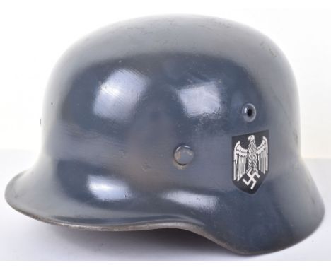 WW2 German Army M35 Helmet. Norwegian re-issue original helmet with post war decal finish complete with liner and chin strap.