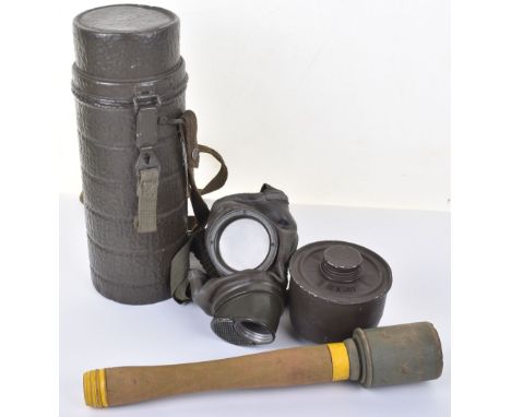 German Gas Mask and Grenade; Post war gas mask in tin and wooden stick grenade. 2 items 