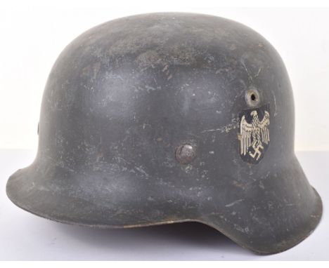 WW2 German Army M42 Helmet; Original helmet shell with post war  decal finish complete with liner and chin strap. Post War Re