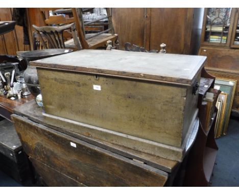 A VICTORIAN PINE TRUNK, with original paint, 14" high x 31.5" wide