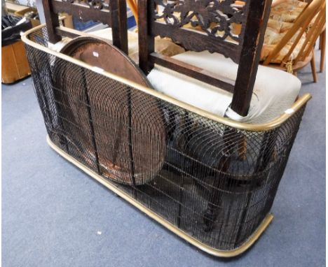 A REGENCY WIRE 'NURSERY' FIREGUARD with brass top and base, 22" high x 40" wide and a copper tray