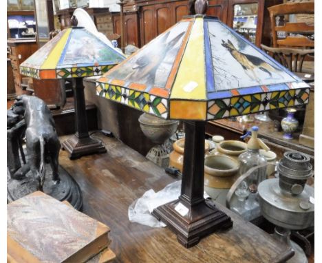 DANBURY MINT; A 'GERMAN SHEPHERD' STAINED GLASS TABLE LAMP in the Tiffany style and its companion with Golden retrievers (2)