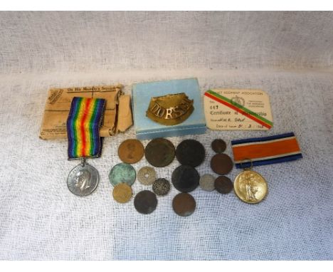 A PAIR OF GREAT WAR MEDALS impresses "2600 PTE. H. W. G. GALE DORSET. R." medal box, Dorset Regiment badge and a collection o