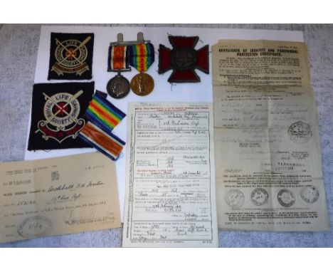 A PAIR OF GREAT WAR MEDALS impressed "5106 PTE. A. R. H. MARTIN. 16-LOND. R.", a 'Royal Life Saving Society' cloth badge, pap