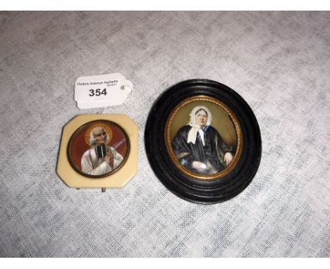 A PORTRAIT MINIATURE OF A SAINT with gilt halo and a painted photographic miniature 
