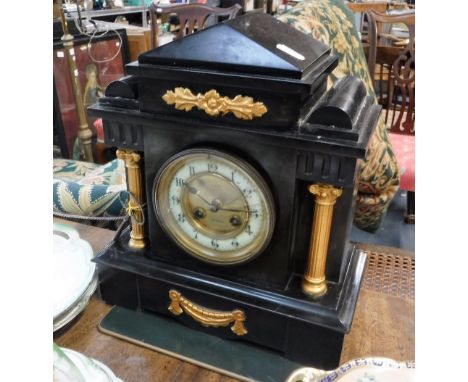 AN EDWARDIAN SLATE CASED MANTEL CLOCK, 12" high