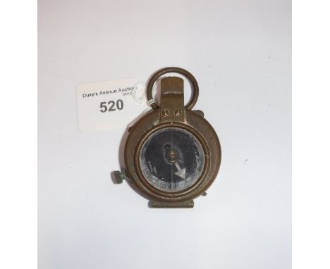 A MILITARY BRASS CASED COMPASS