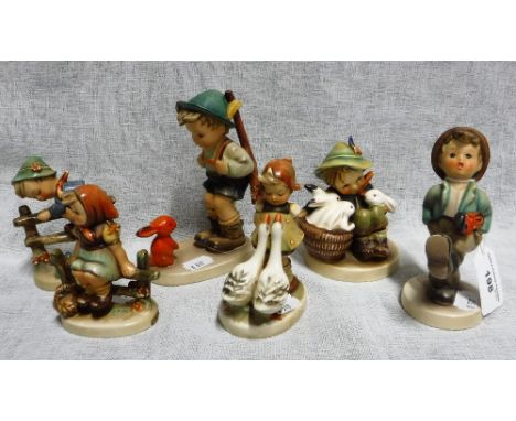 SIX HUMMEL FIGURES of children in various pursuits
