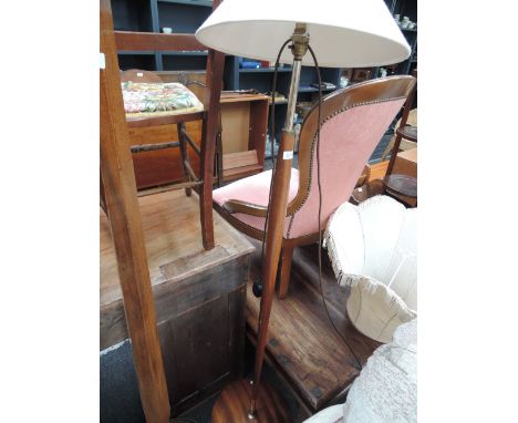 A 1960's sapele standard lamp